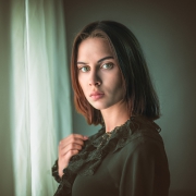 J.
