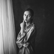 J.