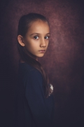 J.