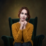 J.